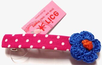 Foto av färgstarkt hårspänne med lekfull design