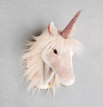 Bild av magisk enhörningsdekoration i creme och rosa