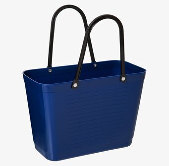 Bild av liten blå väska med stilren och praktisk design