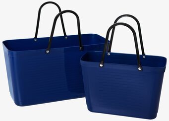 Bild på två blå väskor med funktionell design