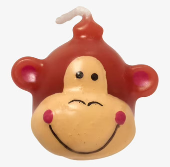 Bild av lekfullt apaansikte ljus för festliga tårtor