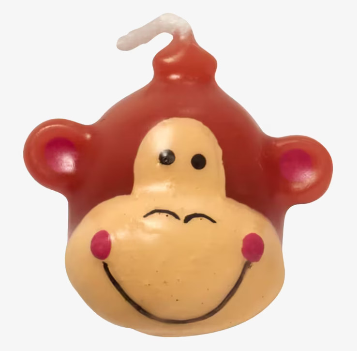 Bild av lekfullt apaansikte ljus för festliga tårtor