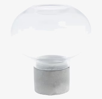 Bild av elegant ljusstake med glas och betongdesign