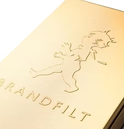 Bild av elegant brandfilt med lyxig guldfärg och design