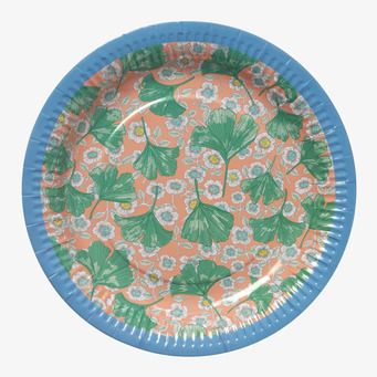 Bild av papperstallrik med blommigt och färgglatt mönster