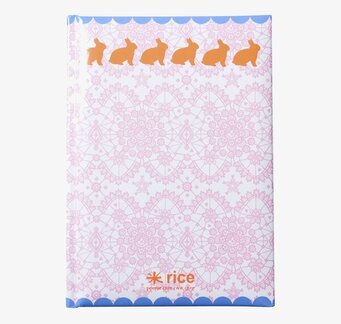 Bild av A5-block med rosa spets och orange kaniner