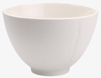 Bild av elegant vit skål i stengods med stilren design