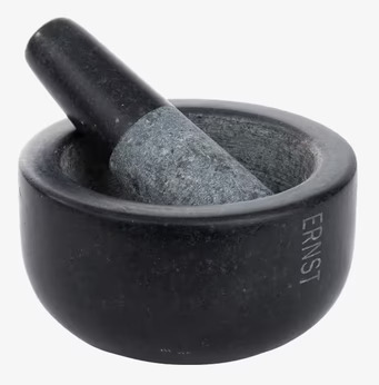 Bild av robust mortel i svart granit med elegant design