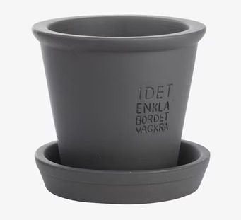 Foto av stilren grå kruka med fat för inomhus och utomhus