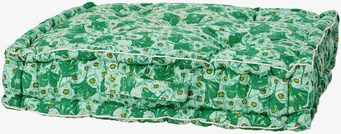 Bild av färgstark golvkudde med naturinspirerat mönster