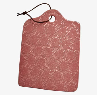 Bild av elegant och funktionell ostbricka i korall