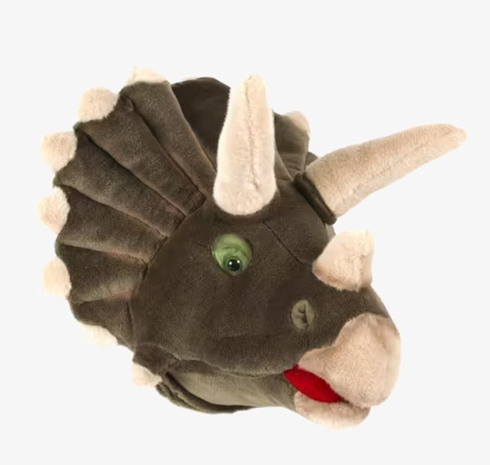 Bild av dinosauriehuvud med horn och glansiga ögon