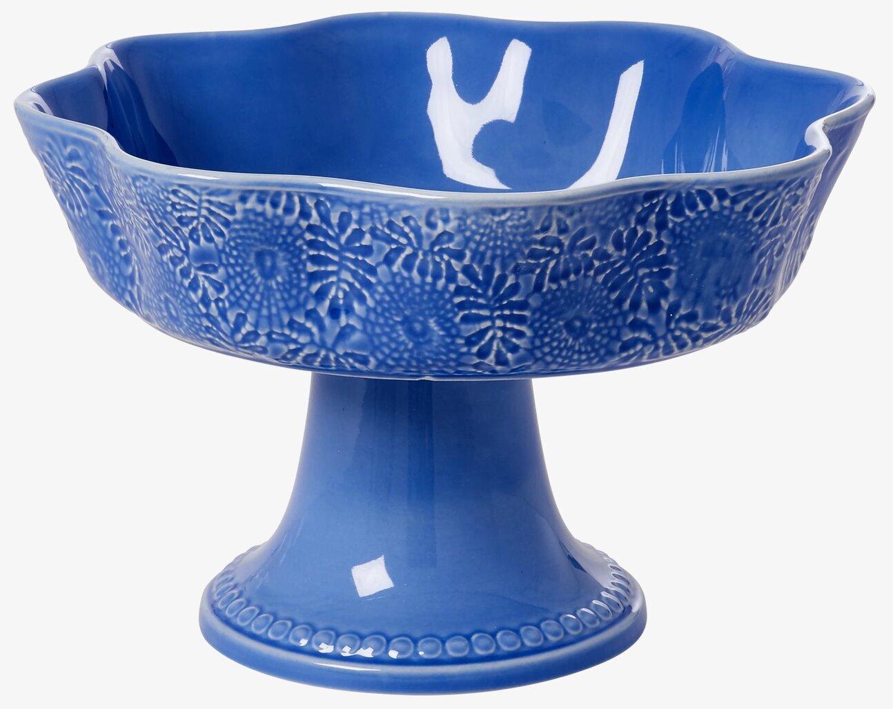 Foto av blå fruktskål med elegant design och mönster