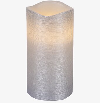 Bild av stilrent vaxljus med silverfärg och textur