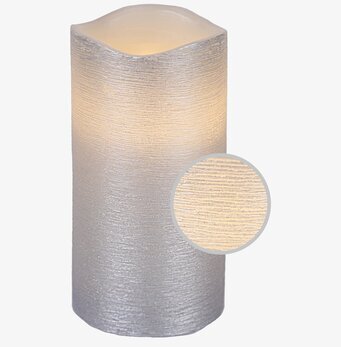 Bild av ett elegant silverfärgat vaxljus med textur